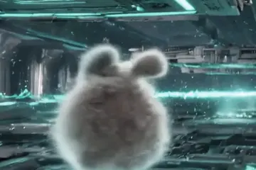 Still of the dust bunny from behind, facing down the corridor